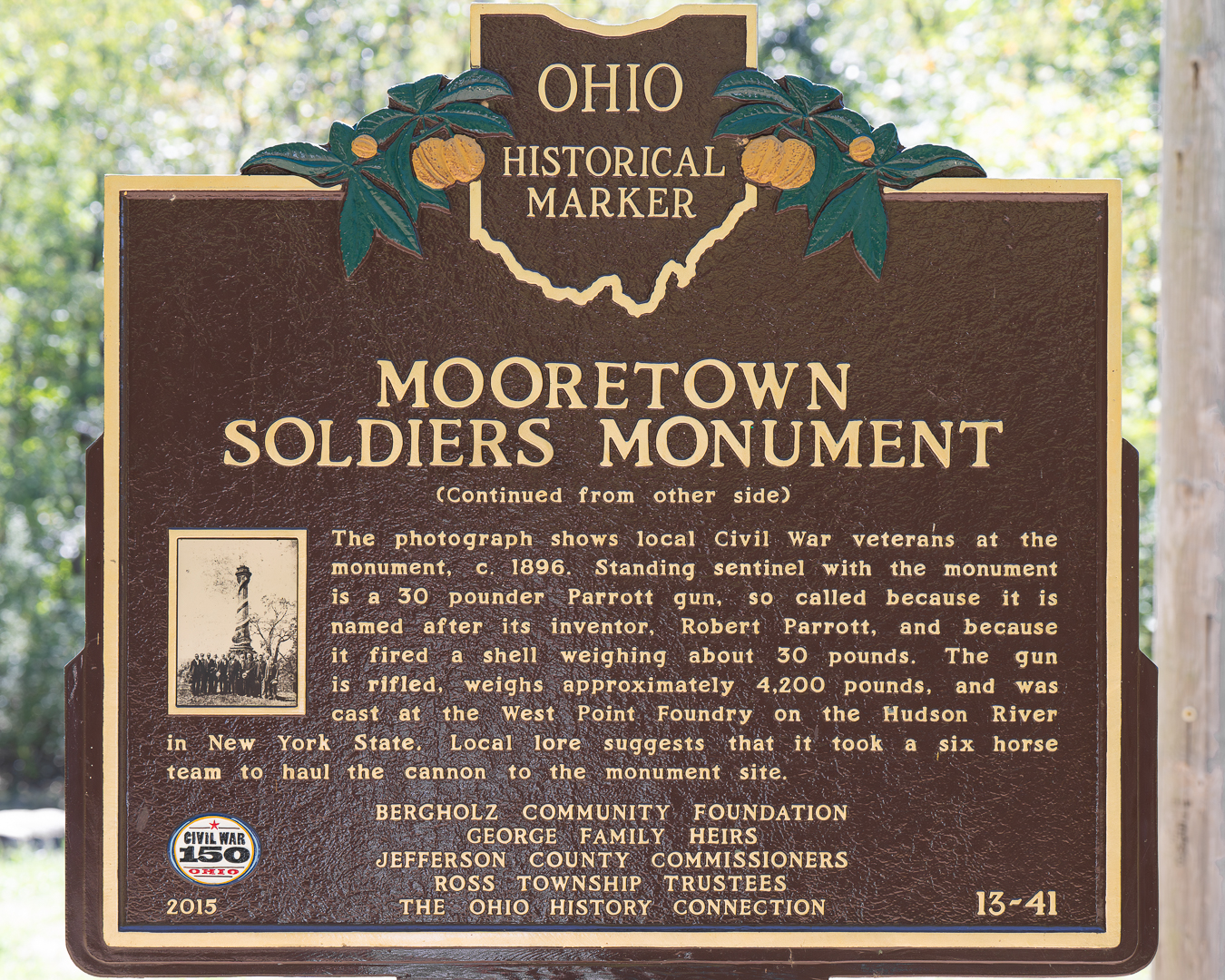 The reverse side of the historical marker dedication of the Mooretown Soldiers Monument.  Shows Civil War veterans at the monument c. 1896.
